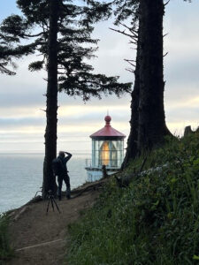 Photographer taking picture of Heceta Head Lighthouse